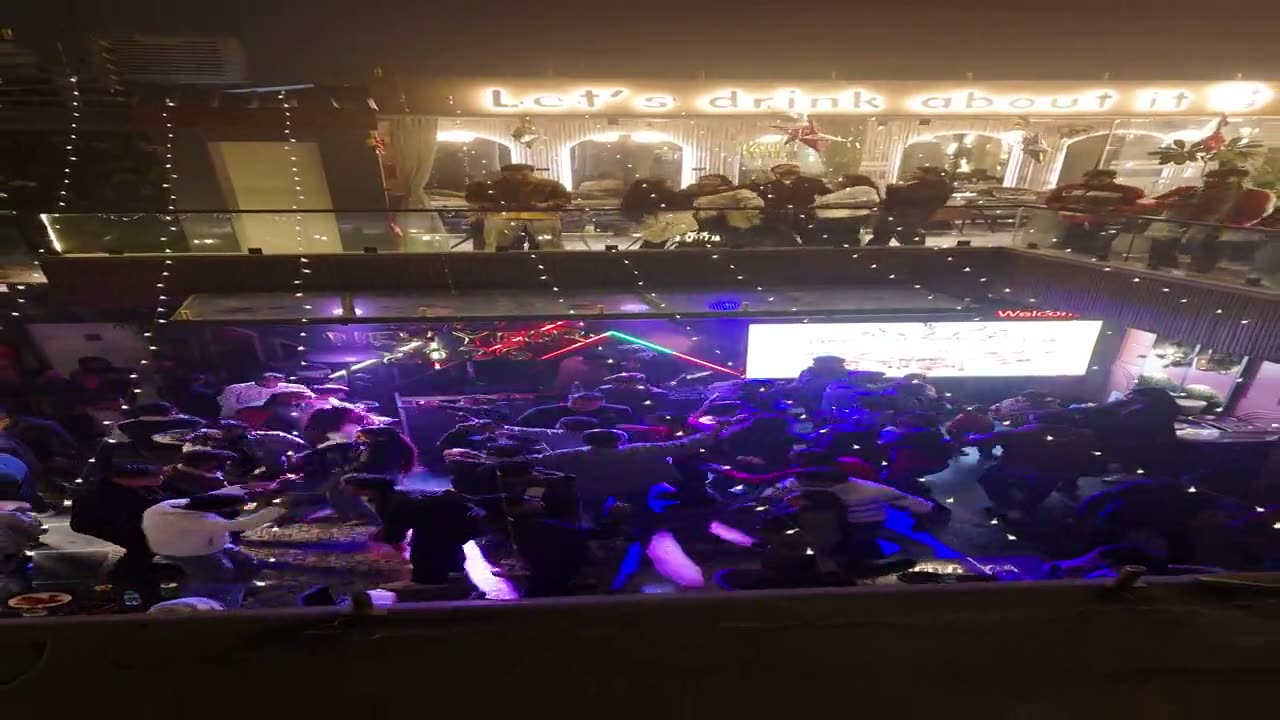 Both floors of the Altitude rooftop on a party night